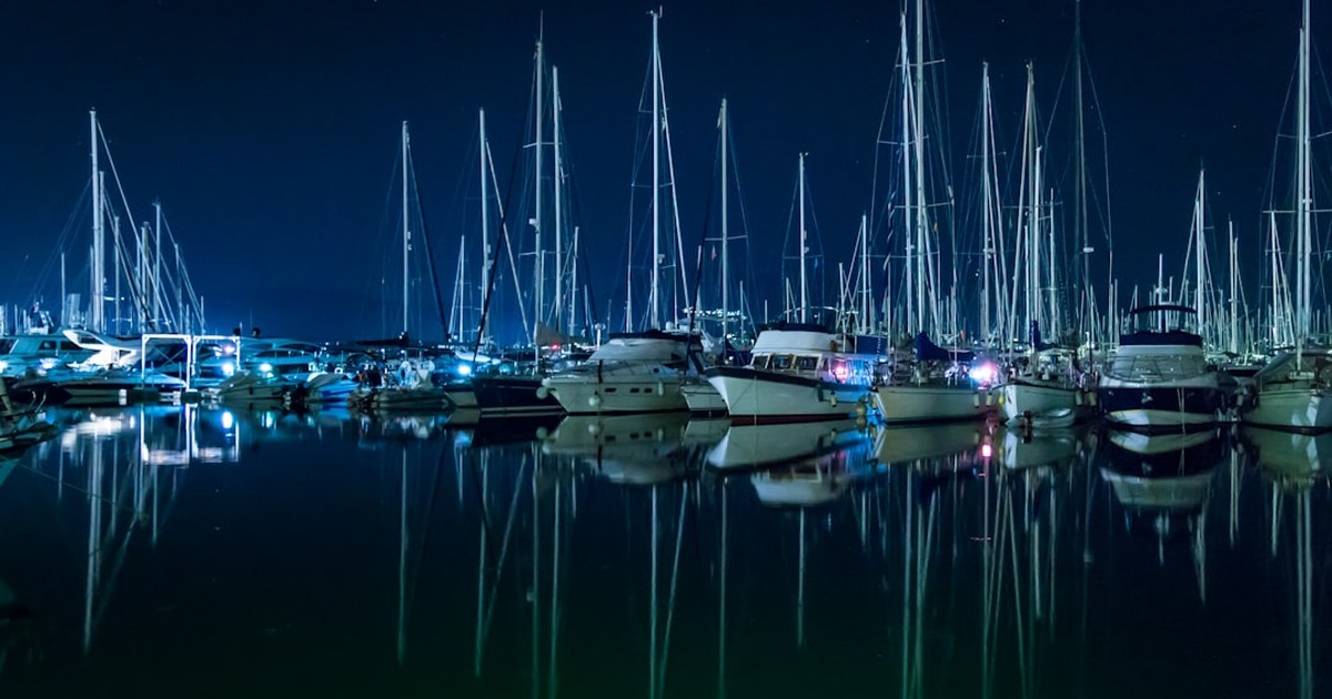 Modern yachts and catamarans lined up at Lefkas Marina in Greece